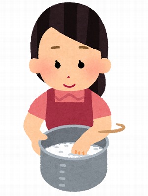 お米を研ぐ女の人